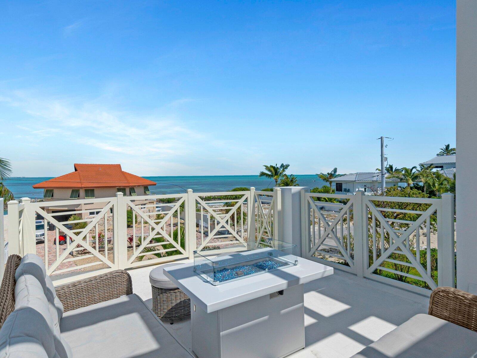 317 East Seaview Circle Marathon, FL 33050 - Photo 2 of 52 a view of balcony with furniture and outdoor kitchen