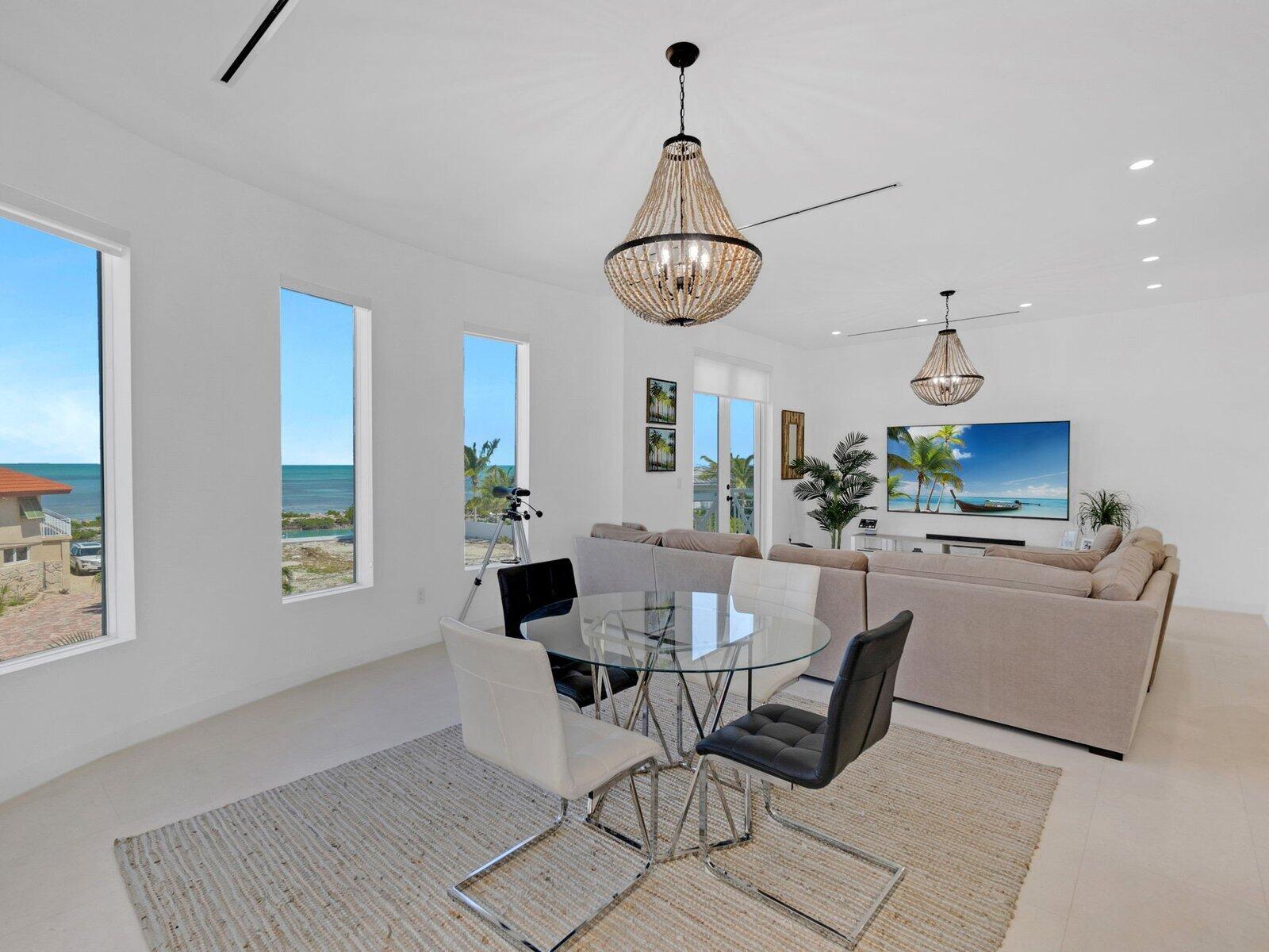 317 East Seaview Circle Marathon, FL 33050 - Photo 27 of 52 a view of a dining room with furniture