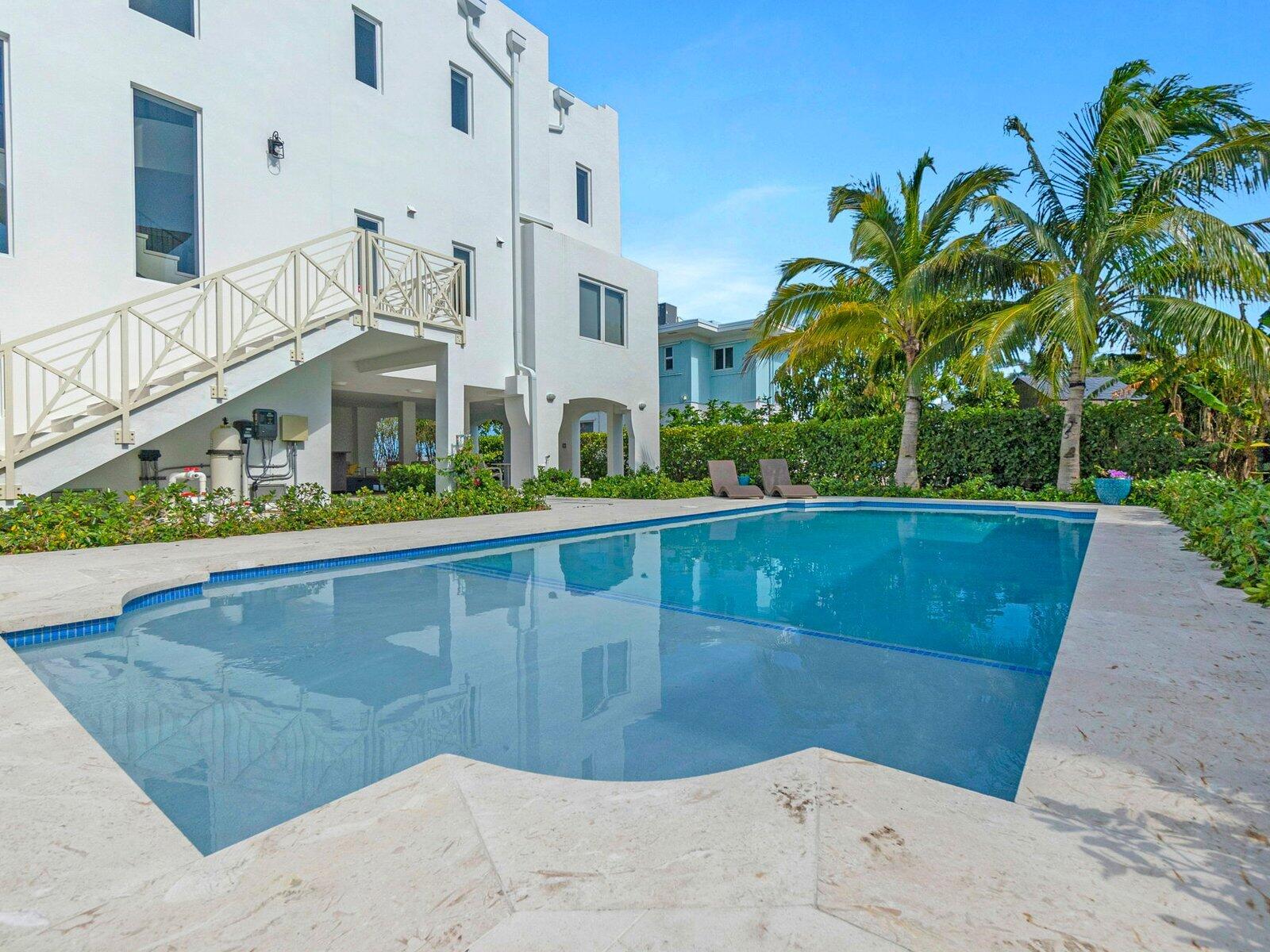 317 East Seaview Circle Marathon, FL 33050 - Photo 51 of 52 a view of swimming pool with building in background