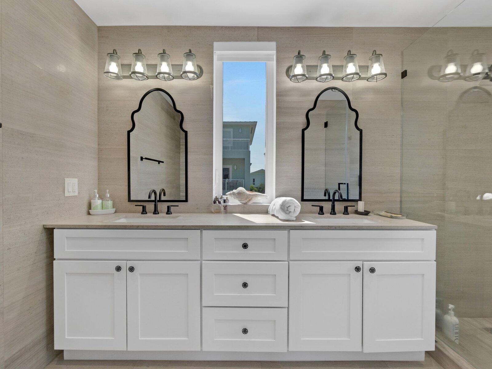 317 East Seaview Circle Marathon, FL 33050 - Photo 7 of 52 a bathroom with double vanity sinks and a mirror