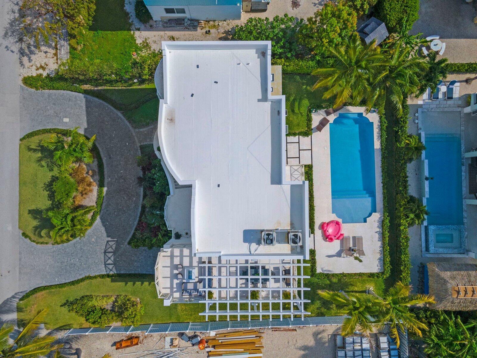 317 East Seaview Circle Marathon, FL 33050 - Photo 10 of 52 an aerial view of a house with a garden