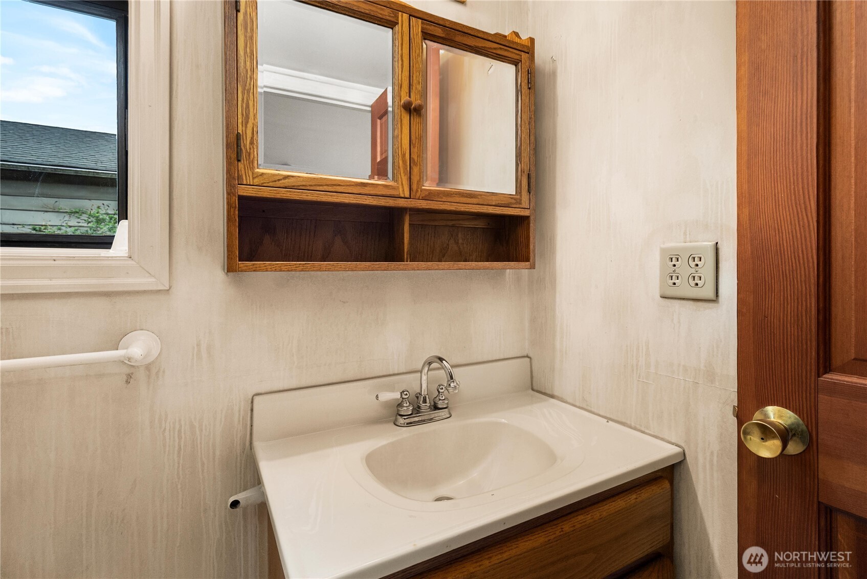 1230 South Donovan Street Seattle, WA 98108 - Photo 20 of 34 a bathroom with a sink a vanity and a window