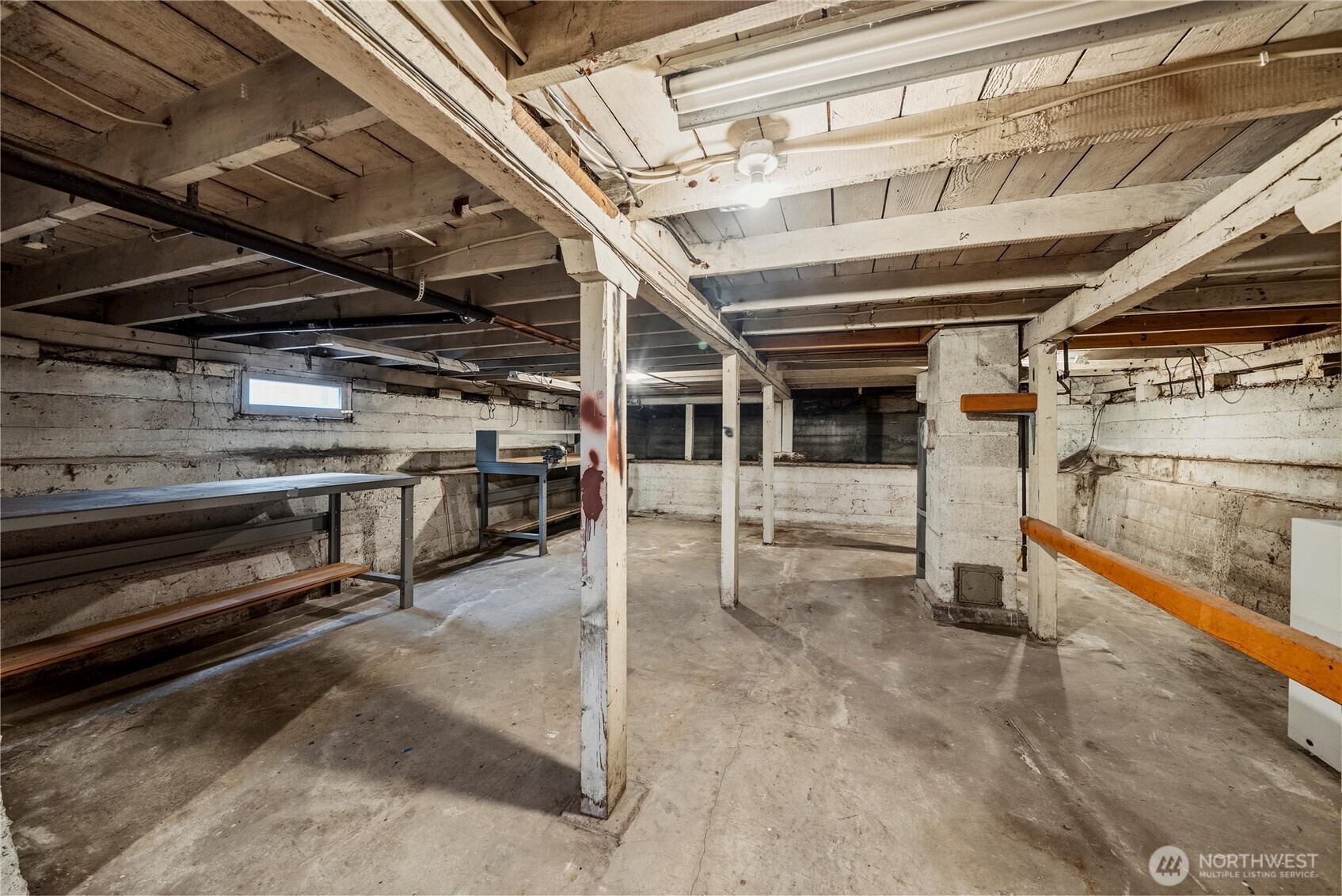 1230 South Donovan Street Seattle, WA 98108 - Photo 23 of 34 a view of an empty room with wooden roof