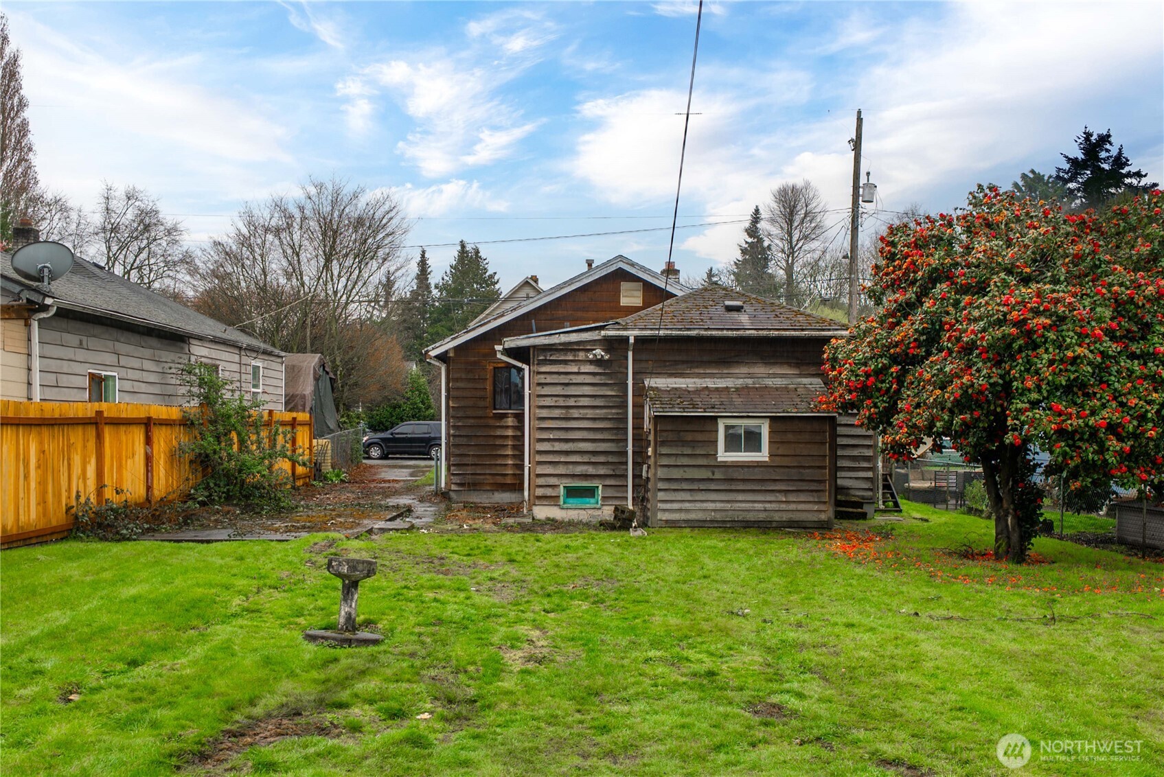 1230 South Donovan Street Seattle, WA 98108 - Photo 29 of 34 a view of a house with backyard and a tree