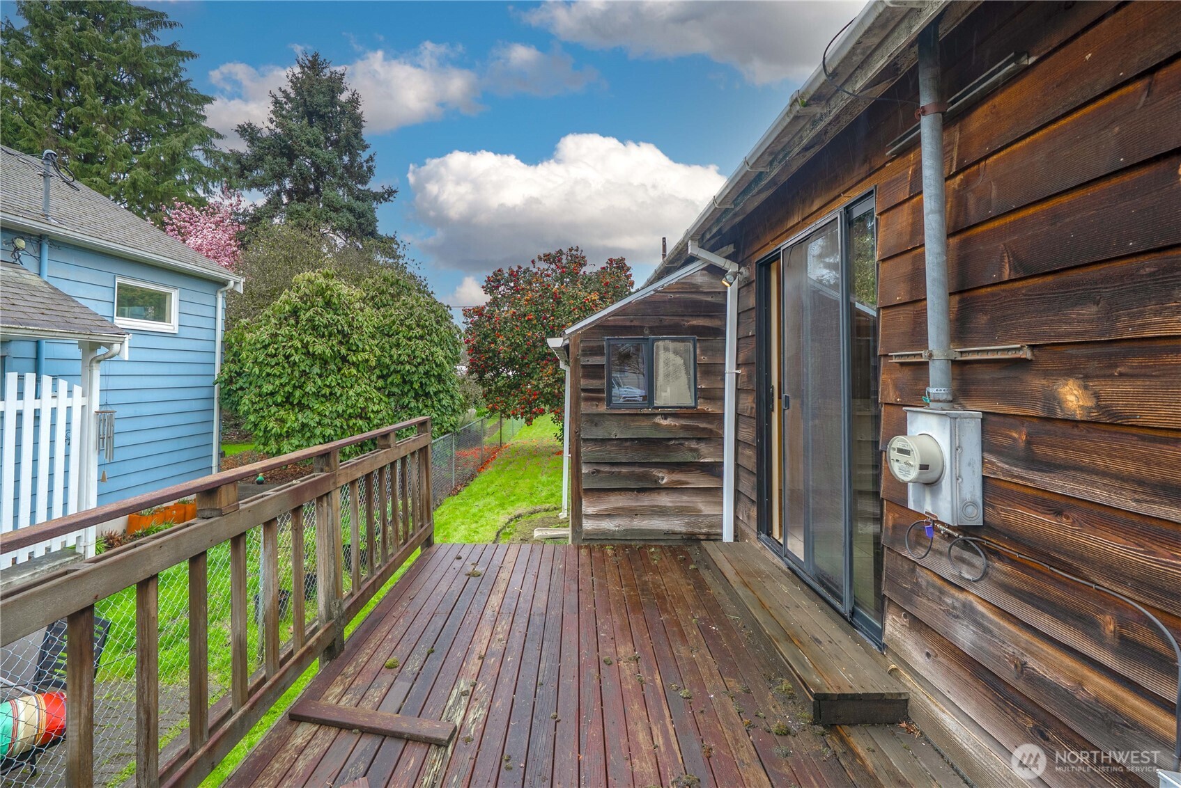 1230 South Donovan Street Seattle, WA 98108 - Photo 31 of 34 a view of balcony with wooden floor and fence
