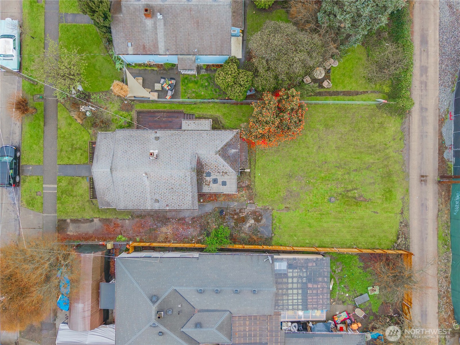 1230 South Donovan Street Seattle, WA 98108 - Photo 4 of 34 an aerial view of a house with a yard basket ball court and outdoor seating