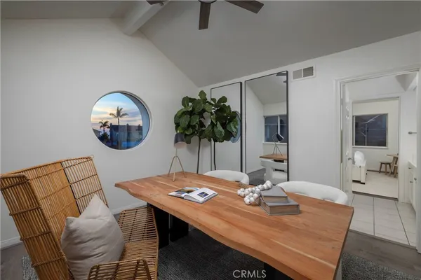 a bathroom with a sink toilet and mirror