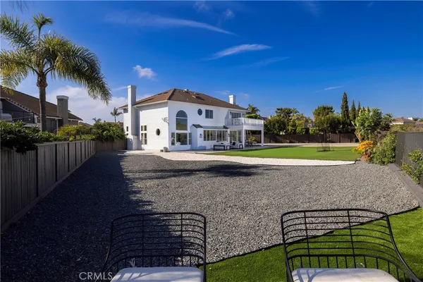 a view of a golf course with a lake