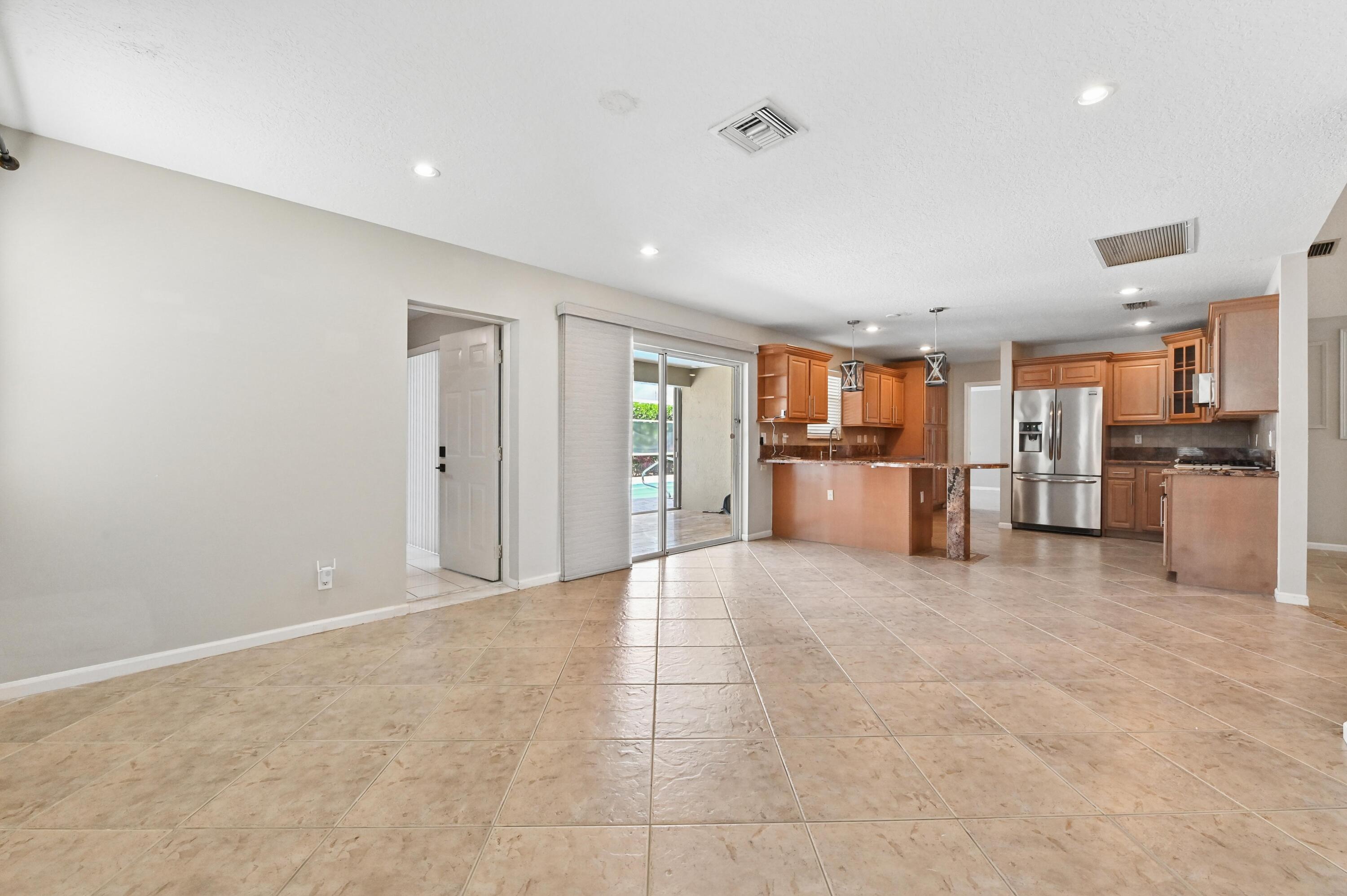 1163 Peninsula Way Greenacres, FL 33413 - Photo 8 of 40 10 Dining area 03