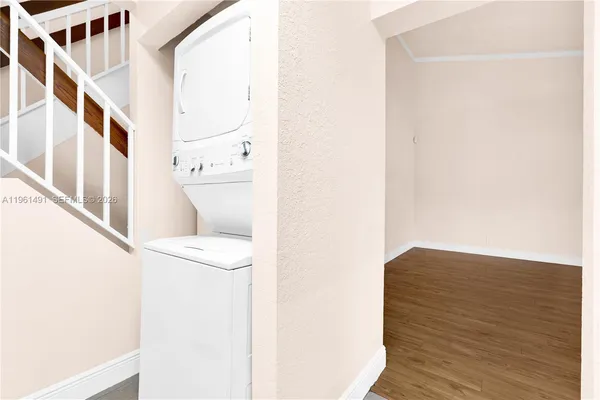 a view of entryway with wooden floor