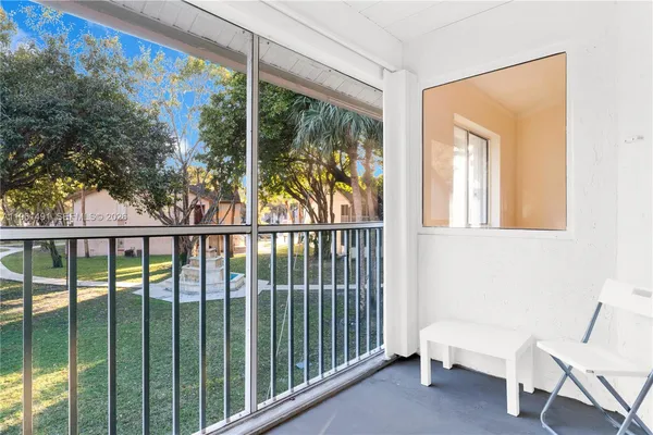 a view of a bathroom with a glass door