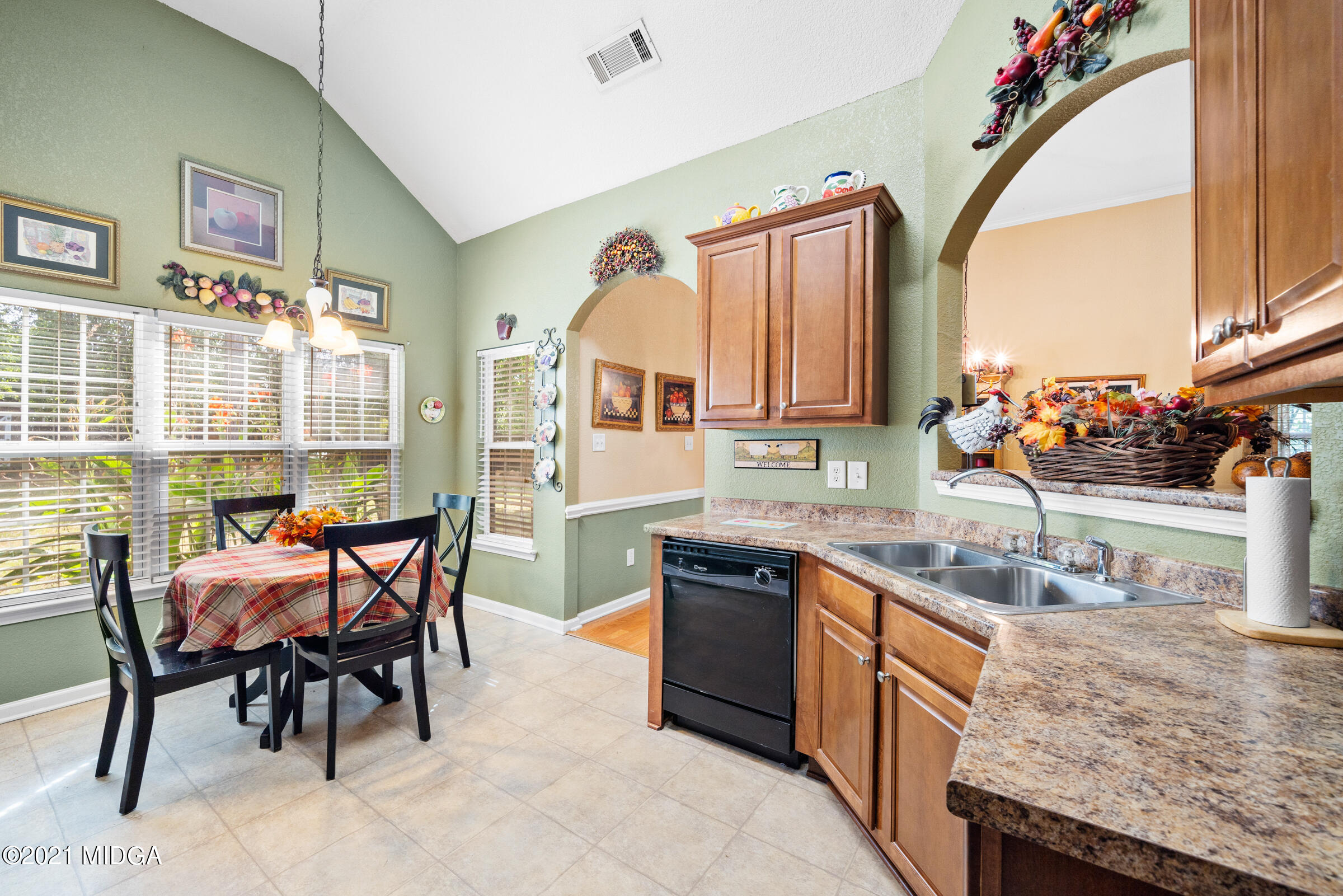 102 Bridgehampton Way Perry, GA 31069 - Photo 13 of 27 a kitchen with granite countertop a sink and a granite counter tops
