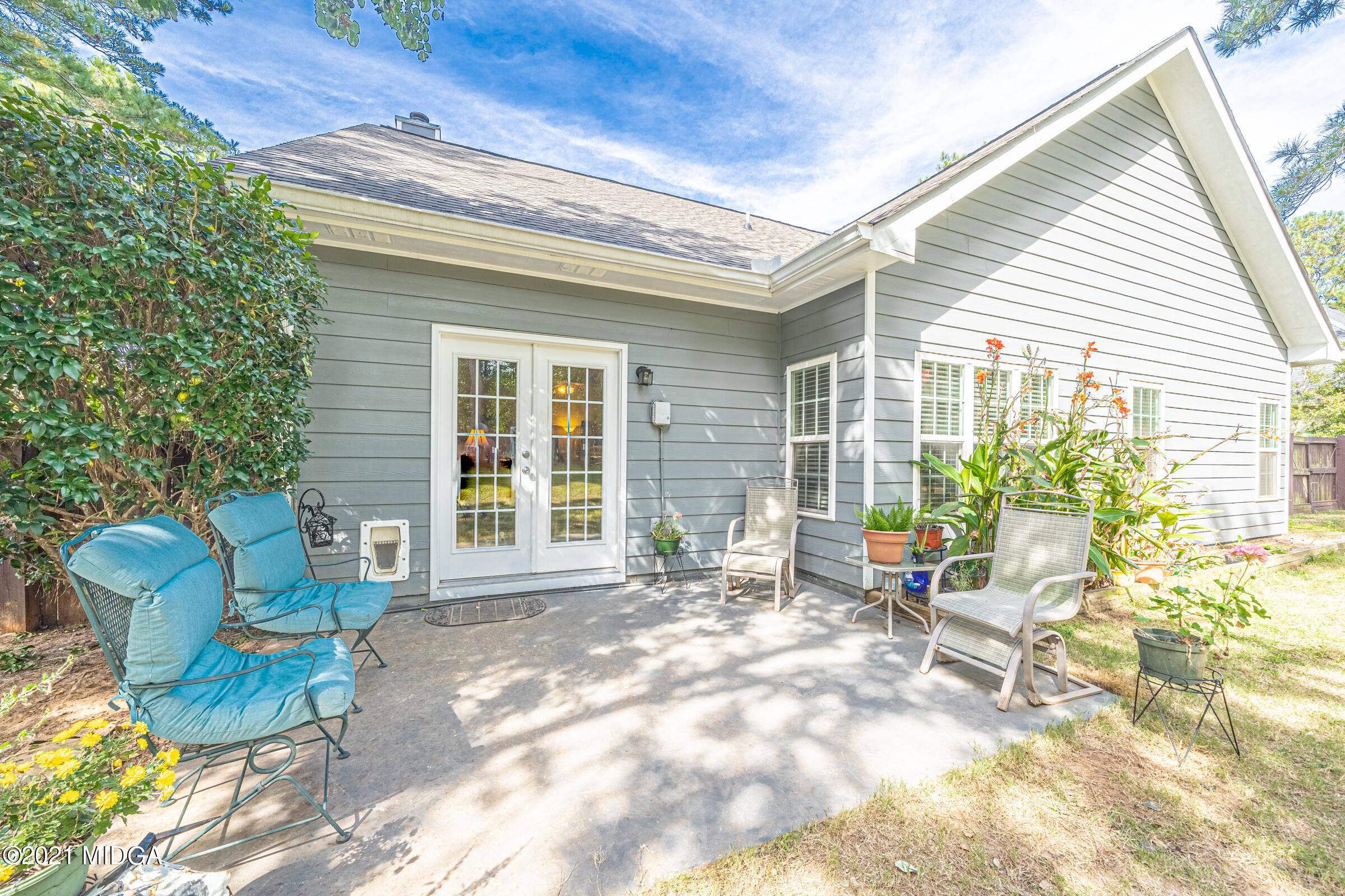 102 Bridgehampton Way Perry, GA 31069 - Photo 23 of 27 a view of a two chairs in the patio
