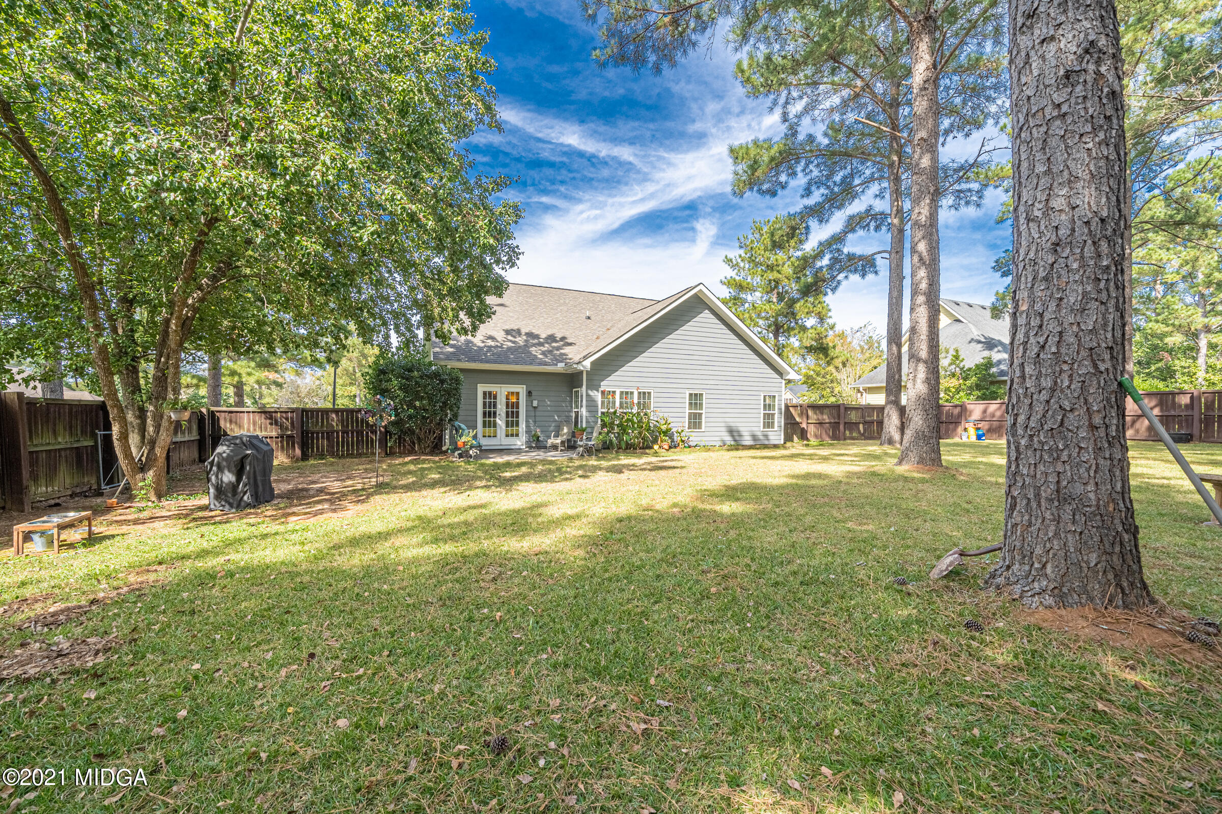 102 Bridgehampton Way Perry, GA 31069 - Photo 24 of 27 a view of house with backyard and garden