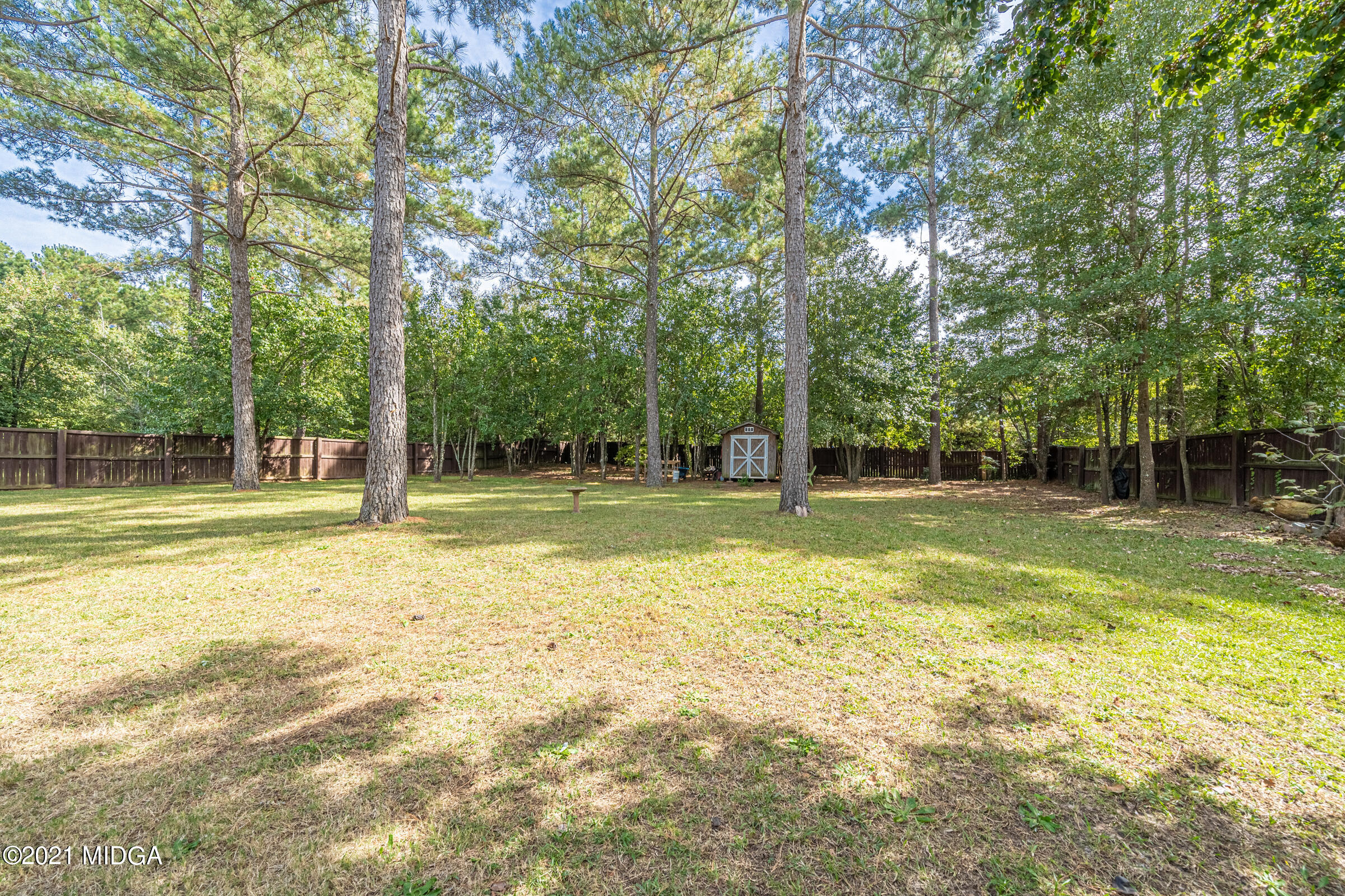 102 Bridgehampton Way Perry, GA 31069 - Photo 25 of 27 a view of a house with a park