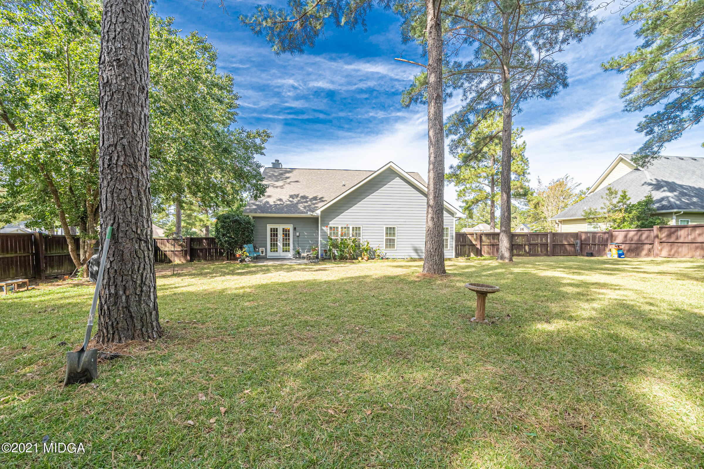 102 Bridgehampton Way Perry, GA 31069 - Photo 27 of 27 a house view with swimming pool in front of it