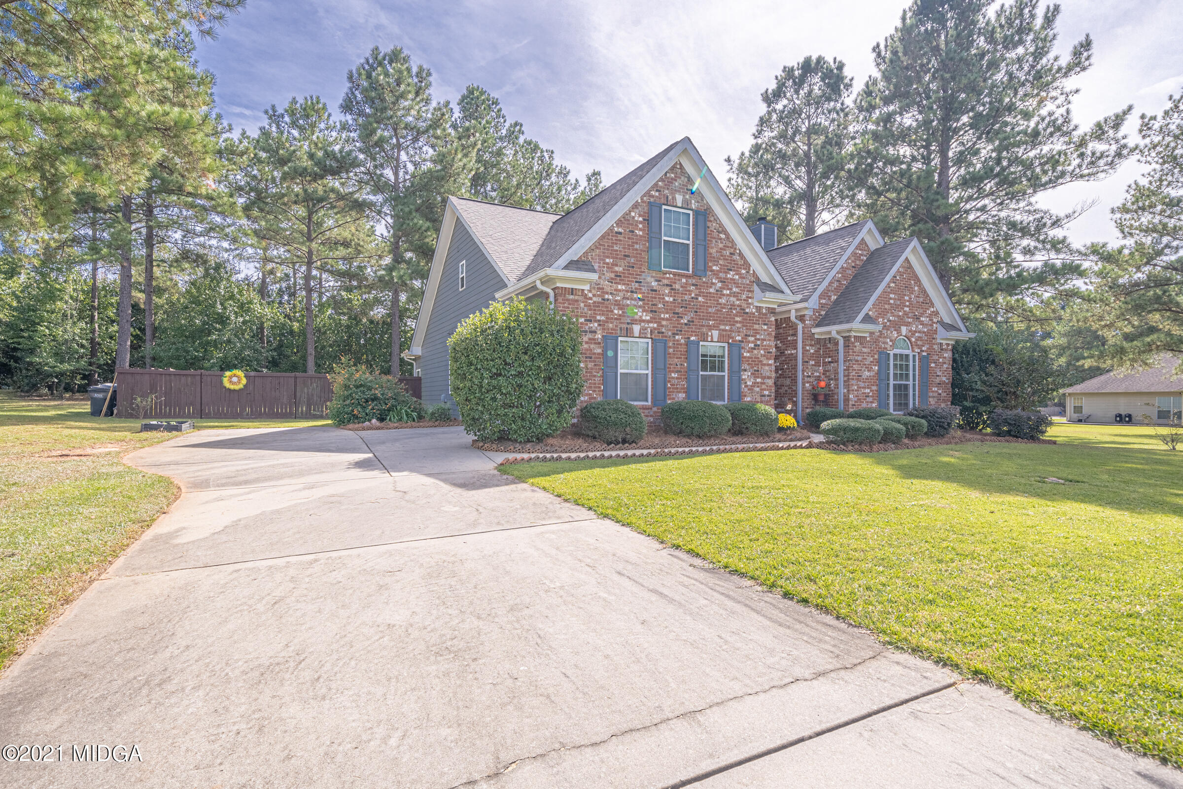 102 Bridgehampton Way Perry, GA 31069 - Photo 4 of 27 a view of outdoor space yard and swimming pool