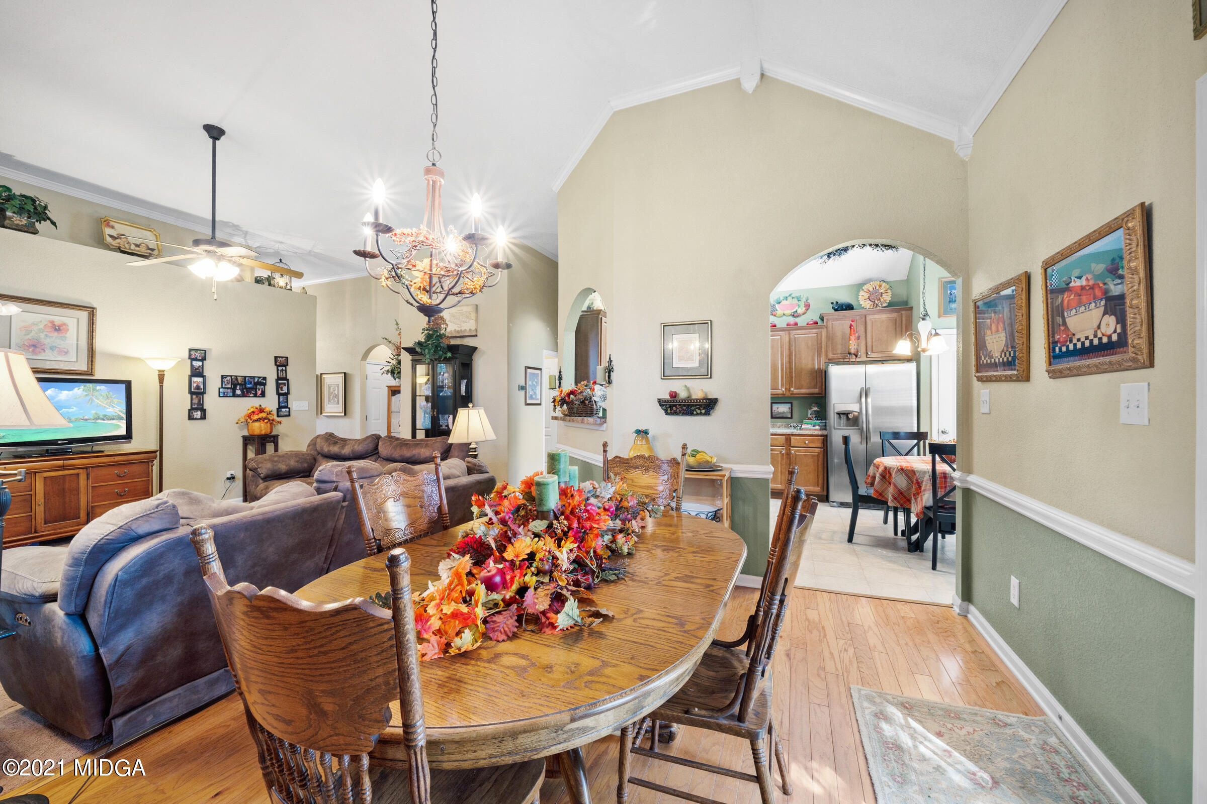 102 Bridgehampton Way Perry, GA 31069 - Photo 10 of 27 a view of a dining room with furniture and a chandelier
