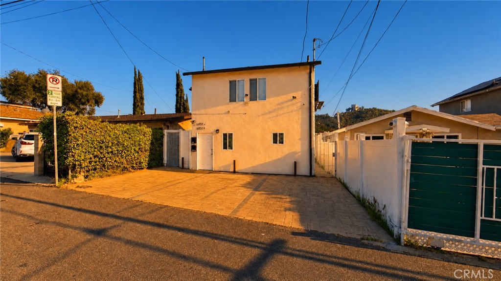 6851 Foothill Boulevard Tujunga, CA 91042 - Photo 33 of 50 a view of a house with backyard