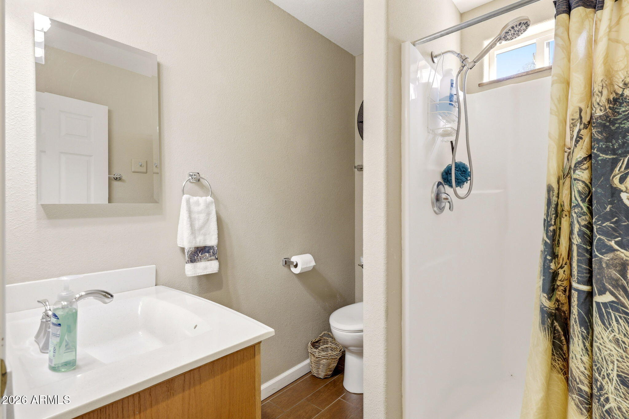 2112 Fishermans Road Overgaard, AZ 85933 - Photo 10 of 18 a bathroom with a sink toilet and shower