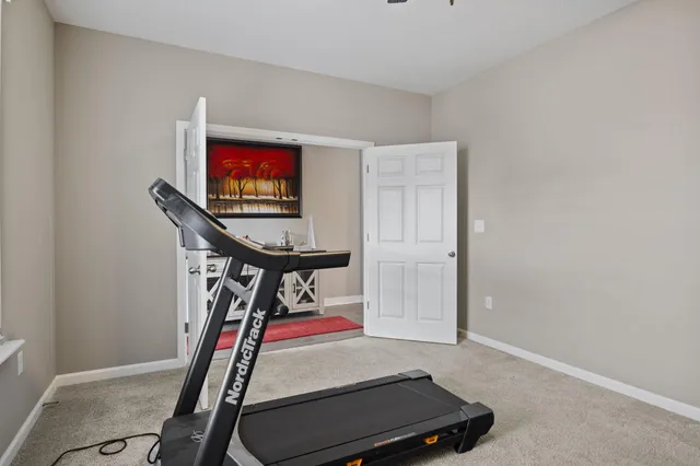 a room with furniture and air conditioner