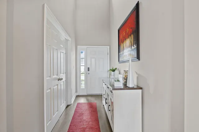 a very nice looking room with wooden floor