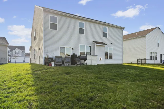 a front view of house with yard