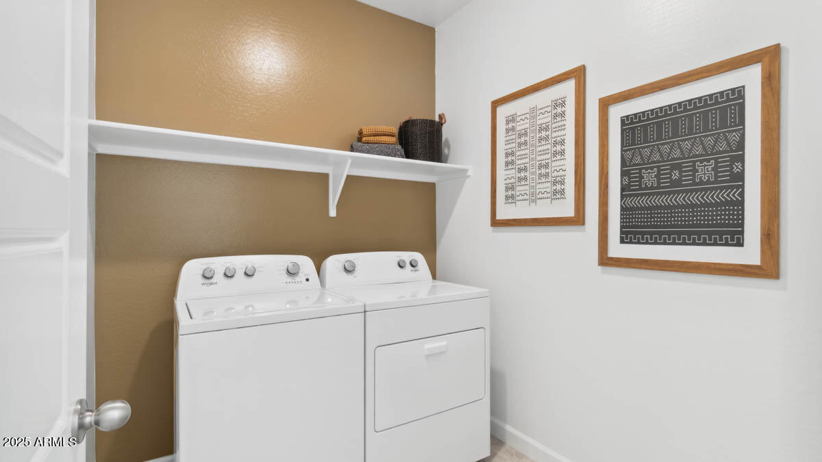 8459 West Gehrig Way Florence, AZ 85132 - Photo 17 of 37 a utility room with dryer and washer