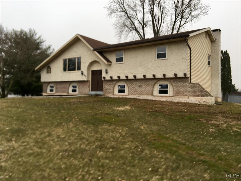 7501 Richard Lane Bath, PA 18014 - Photo 1 of 1 a front view of a house with garden