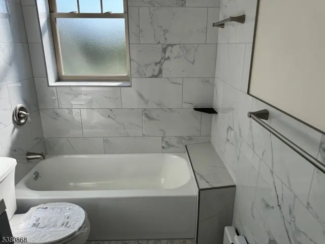 a view of a refrigerator in kitchen