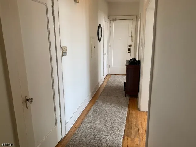 a kitchen with stainless steel appliances granite countertop a refrigerator and a stove