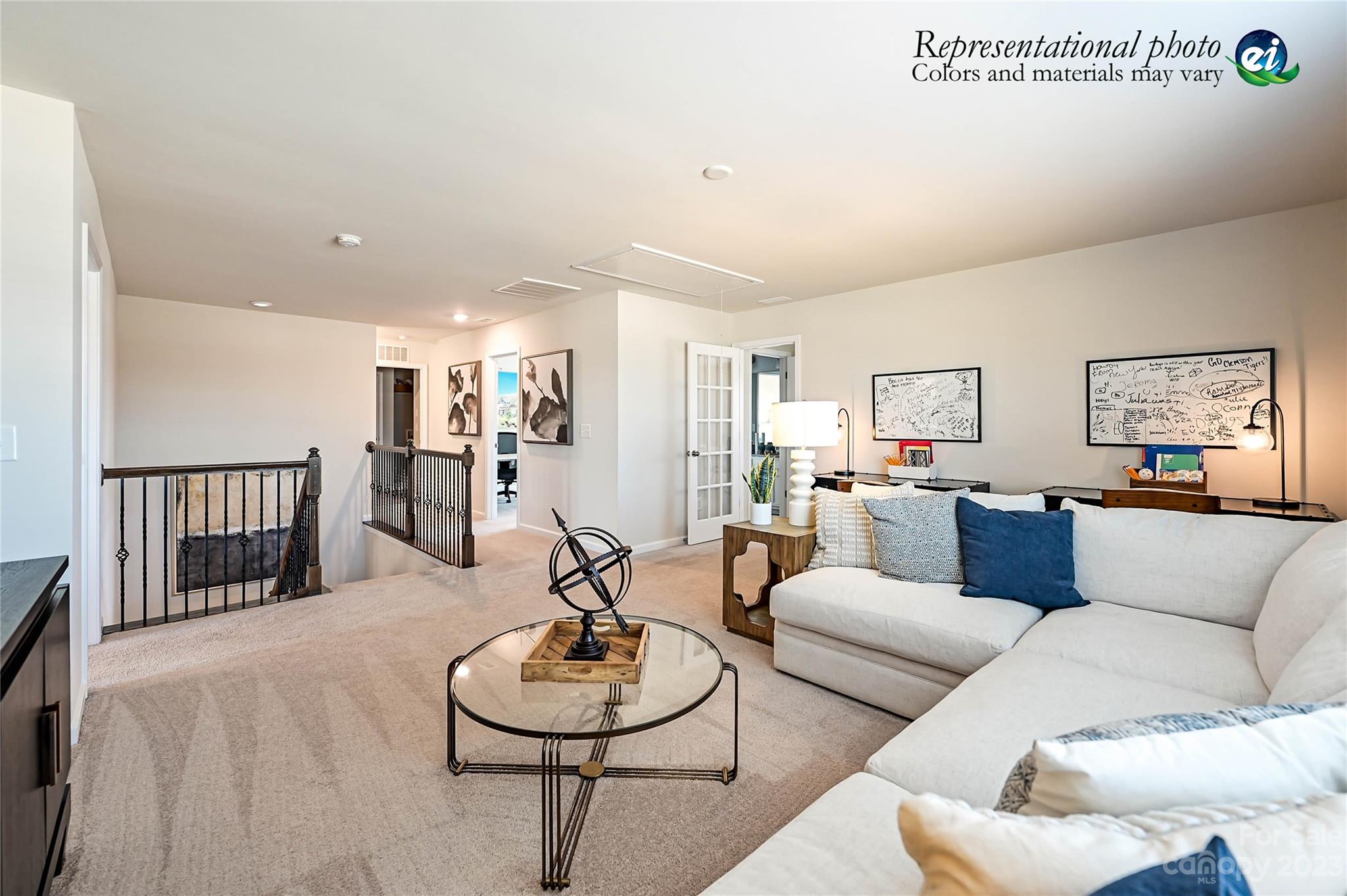 5653 Soft Shell Drive, Unit 376 Lancaster, SC 29720 - Photo 18 of 30 a living room with furniture and a wooden floor