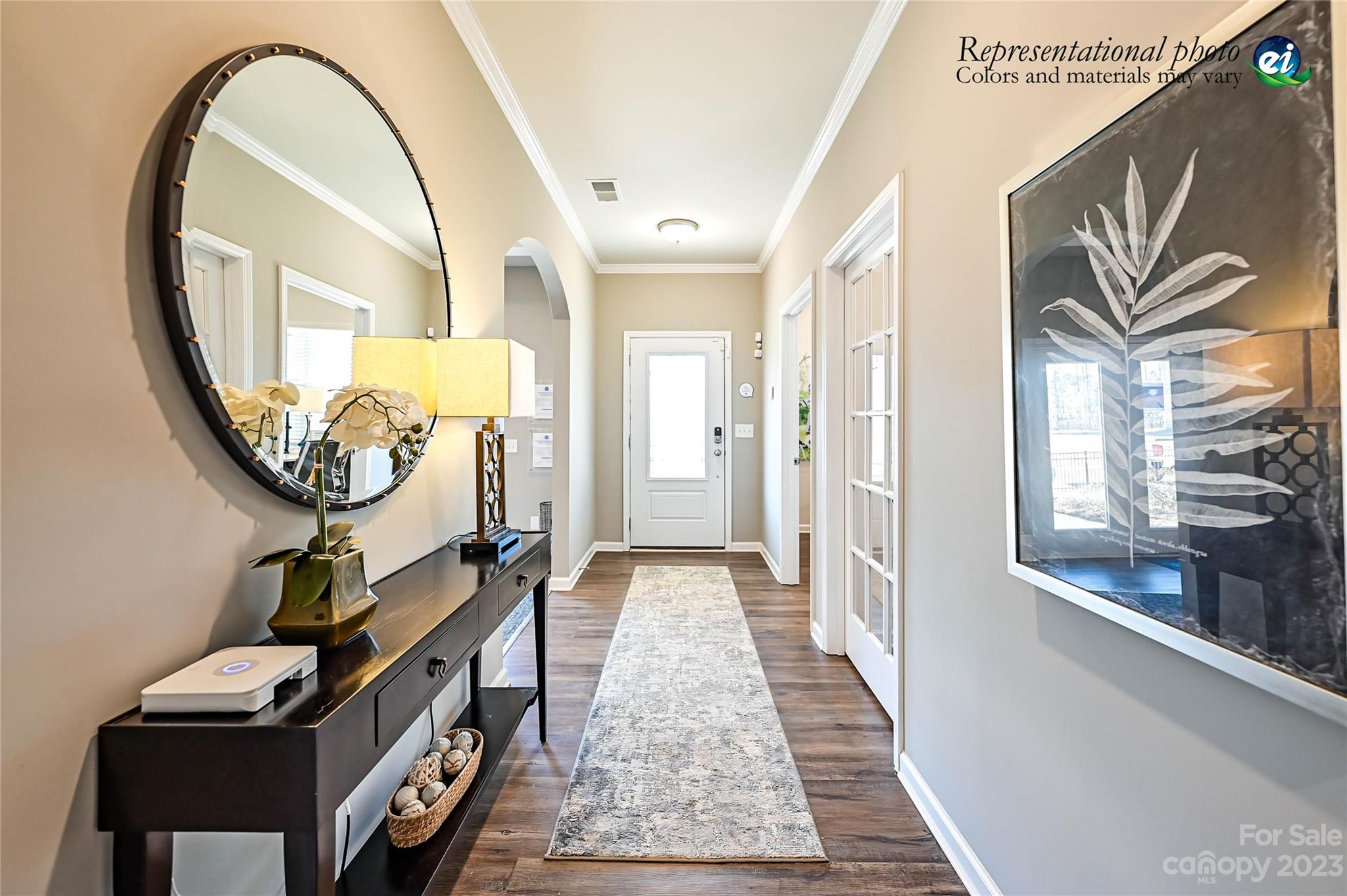 5653 Soft Shell Drive, Unit 376 Lancaster, SC 29720 - Photo 3 of 30 a view of a hallway with wooden floor and entryway