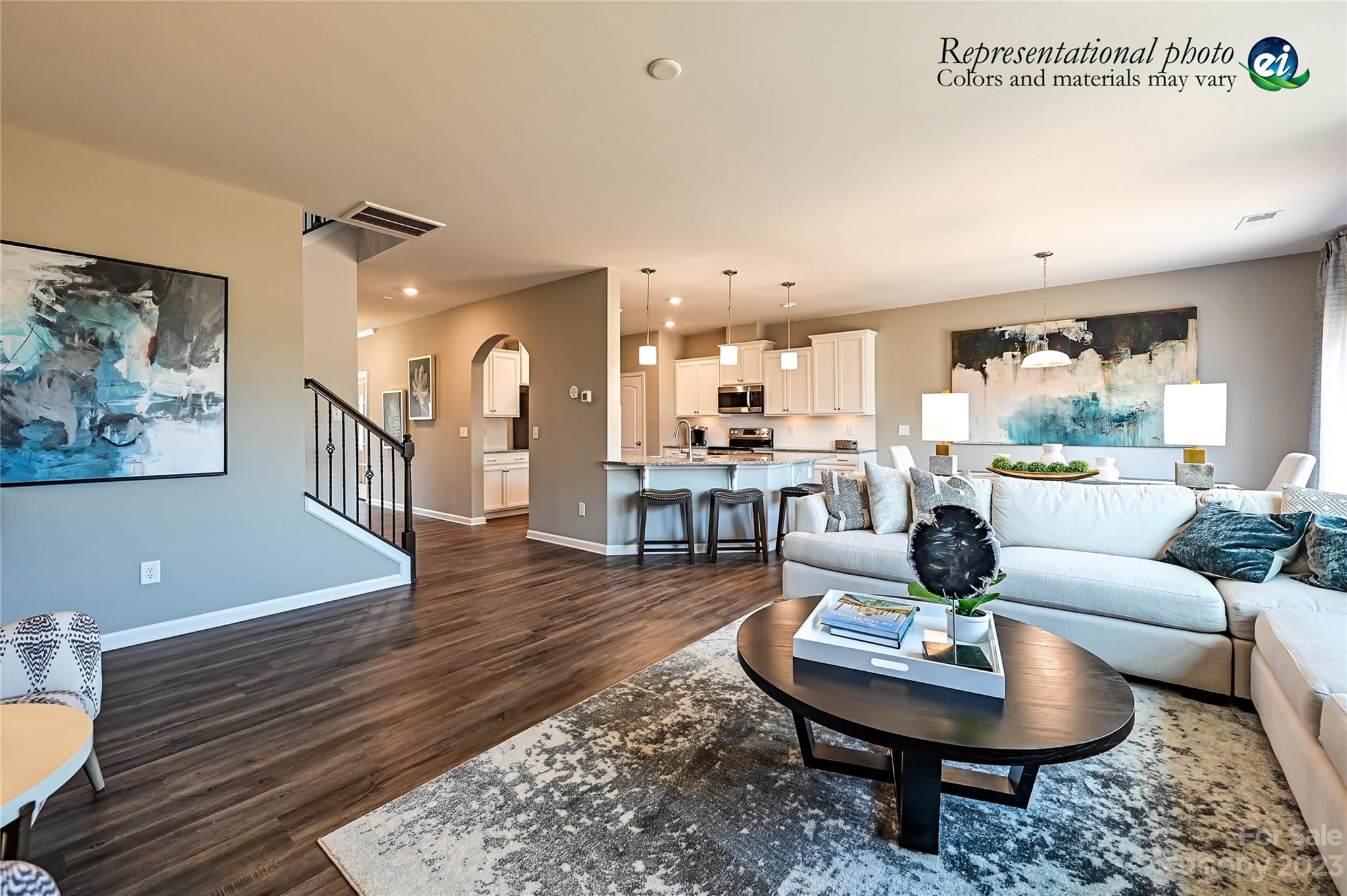 5653 Soft Shell Drive, Unit 376 Lancaster, SC 29720 - Photo 5 of 30 a living room with fireplace furniture and a wooden floor