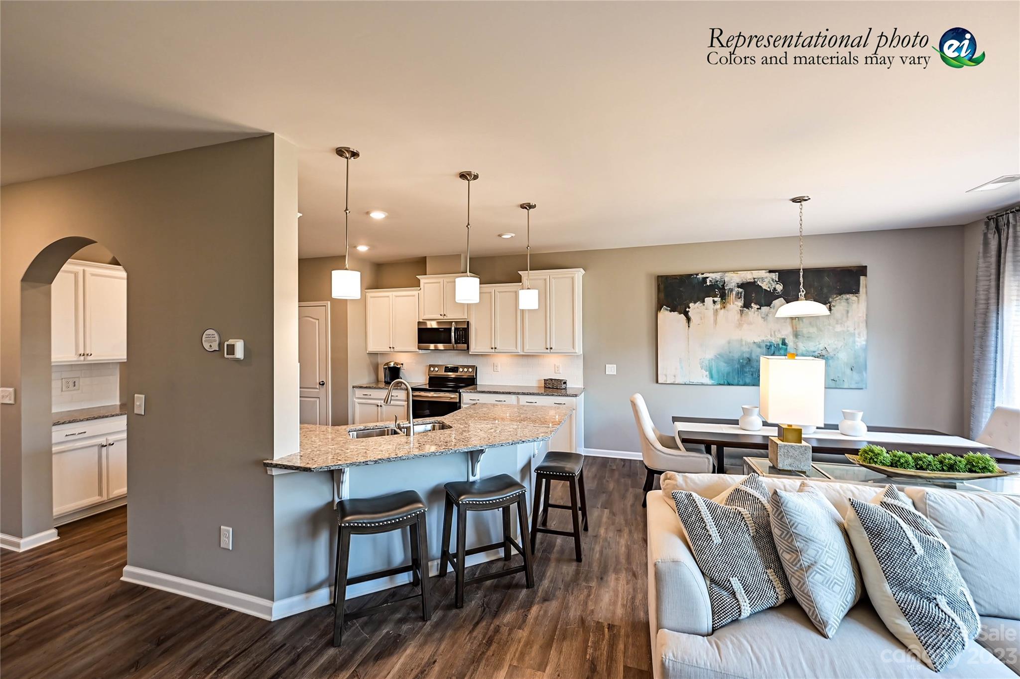 5653 Soft Shell Drive, Unit 376 Lancaster, SC 29720 - Photo 6 of 30 a living room with furniture and wooden floor