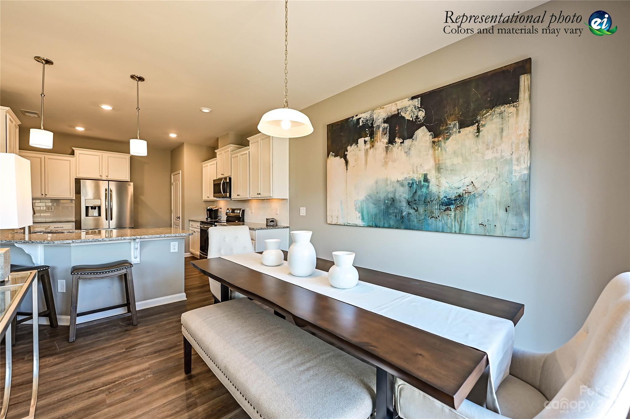 5653 Soft Shell Drive, Unit 376 Lancaster, SC 29720 - Photo 7 of 30 a very nice looking dining room with a large window
