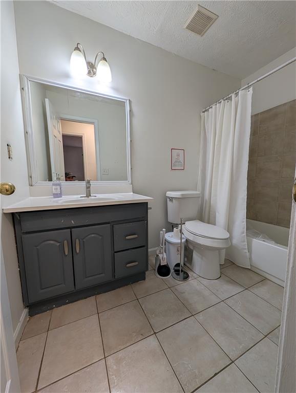 355 Shannon Way Lawrenceville, GA 30044 - Photo 13 of 42 a bathroom with a toilet sink and mirror