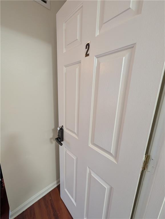 355 Shannon Way Lawrenceville, GA 30044 - Photo 17 of 42 a view of a hallway with wooden floor
