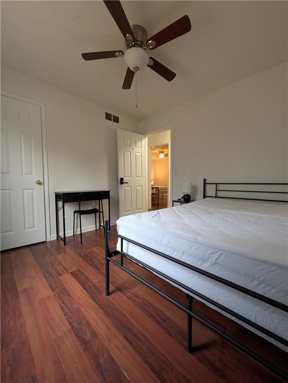 355 Shannon Way Lawrenceville, GA 30044 - Photo 24 of 42 a bedroom with a bed and a chandelier