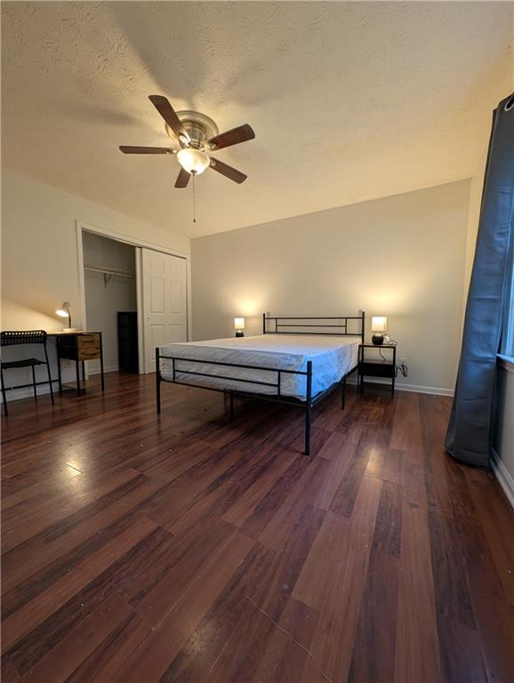 355 Shannon Way Lawrenceville, GA 30044 - Photo 3 of 42 a living room with furniture and a wooden floor