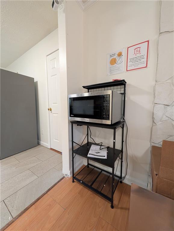 355 Shannon Way Lawrenceville, GA 30044 - Photo 32 of 42 a living room with furniture and a flat screen tv