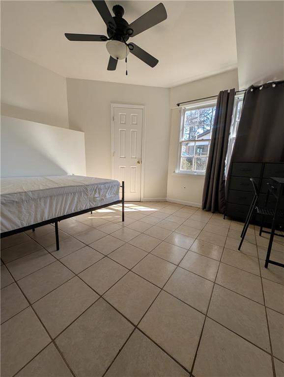 355 Shannon Way Lawrenceville, GA 30044 - Photo 39 of 42 a view of a livingroom with furniture and a ceiling fan