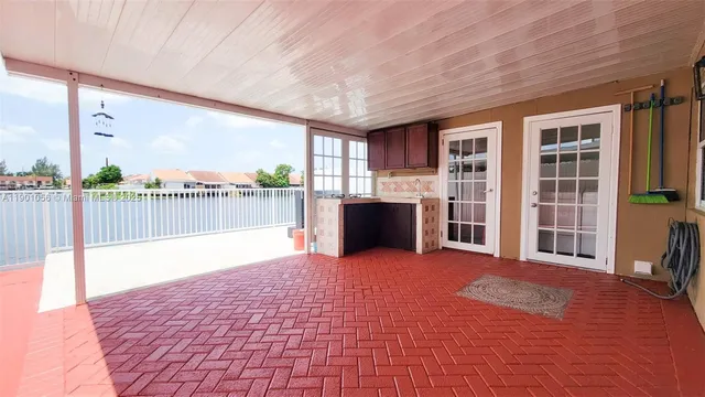a view of an empty room with a fireplace