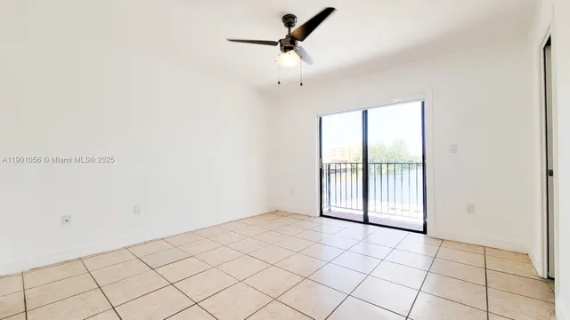 a view of an empty room and window