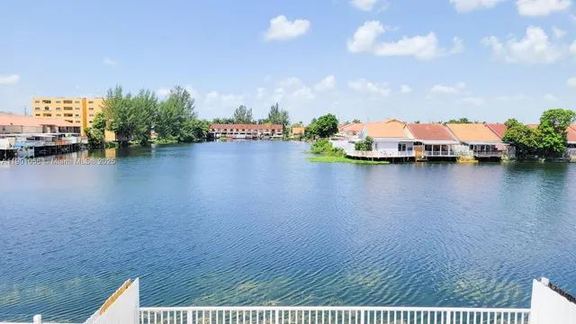 a view of a lake with houses