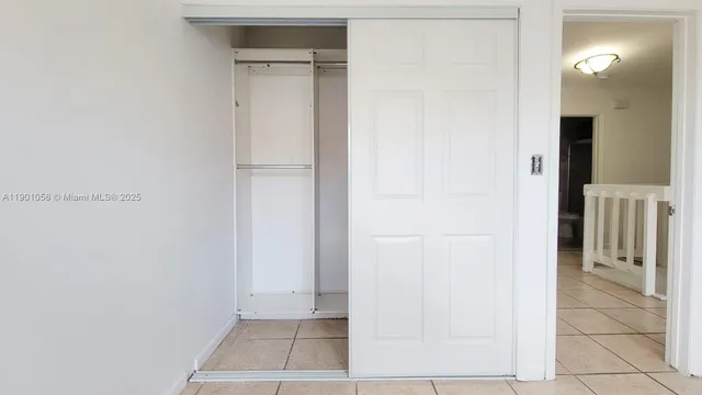 a view of a room with a wardrobe space