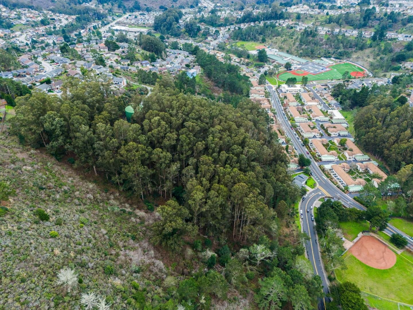0 Everglades Drive Pacifica, CA 94044 - Photo 26 of 29 an aerial view of residential houses with outdoor space and trees