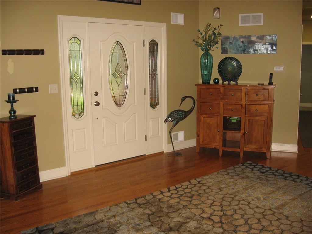 7 Sugar Run Road Eighty Four, PA 15330 - Photo 3 of 25 Foyer entry opens to spacious Great room with 15' ceilings and hardwood flooring.
