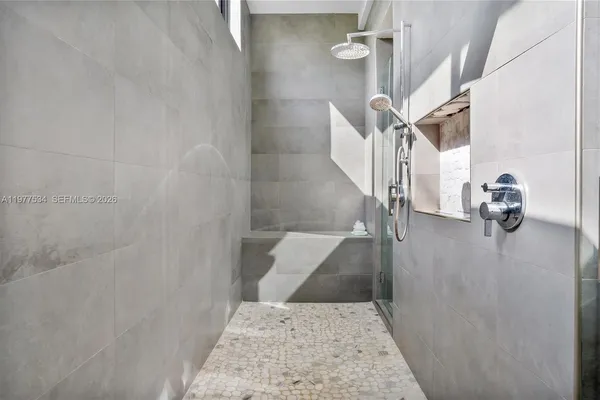 a view of staircase with white walls
