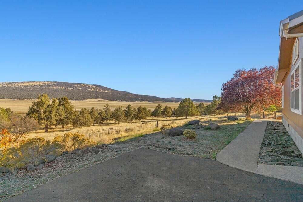 17550 South Poe Valley Road Klamath Falls, OR 97603 - Photo 56 of 59 a view of an ocean with a mountain in the background